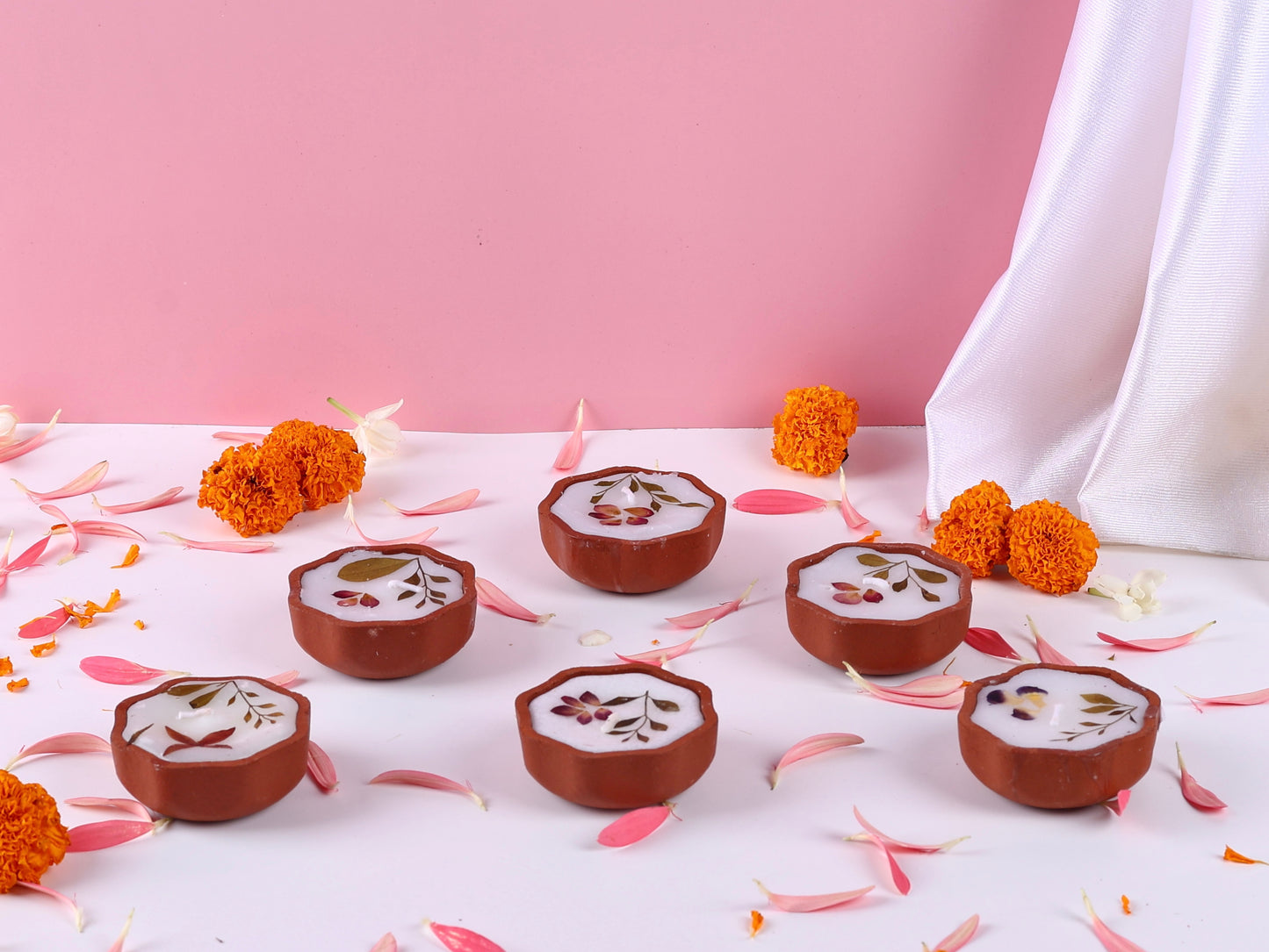 Scented wax diyas with dried florals - Set of 4