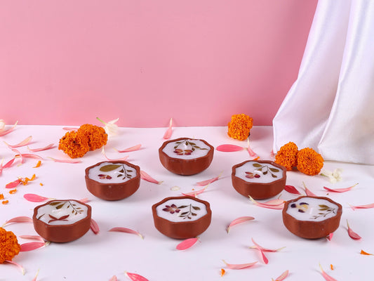 Scented wax diyas with dried florals - Set of 4