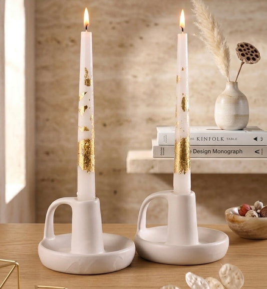 Candle holders with gold foil tapered candles
