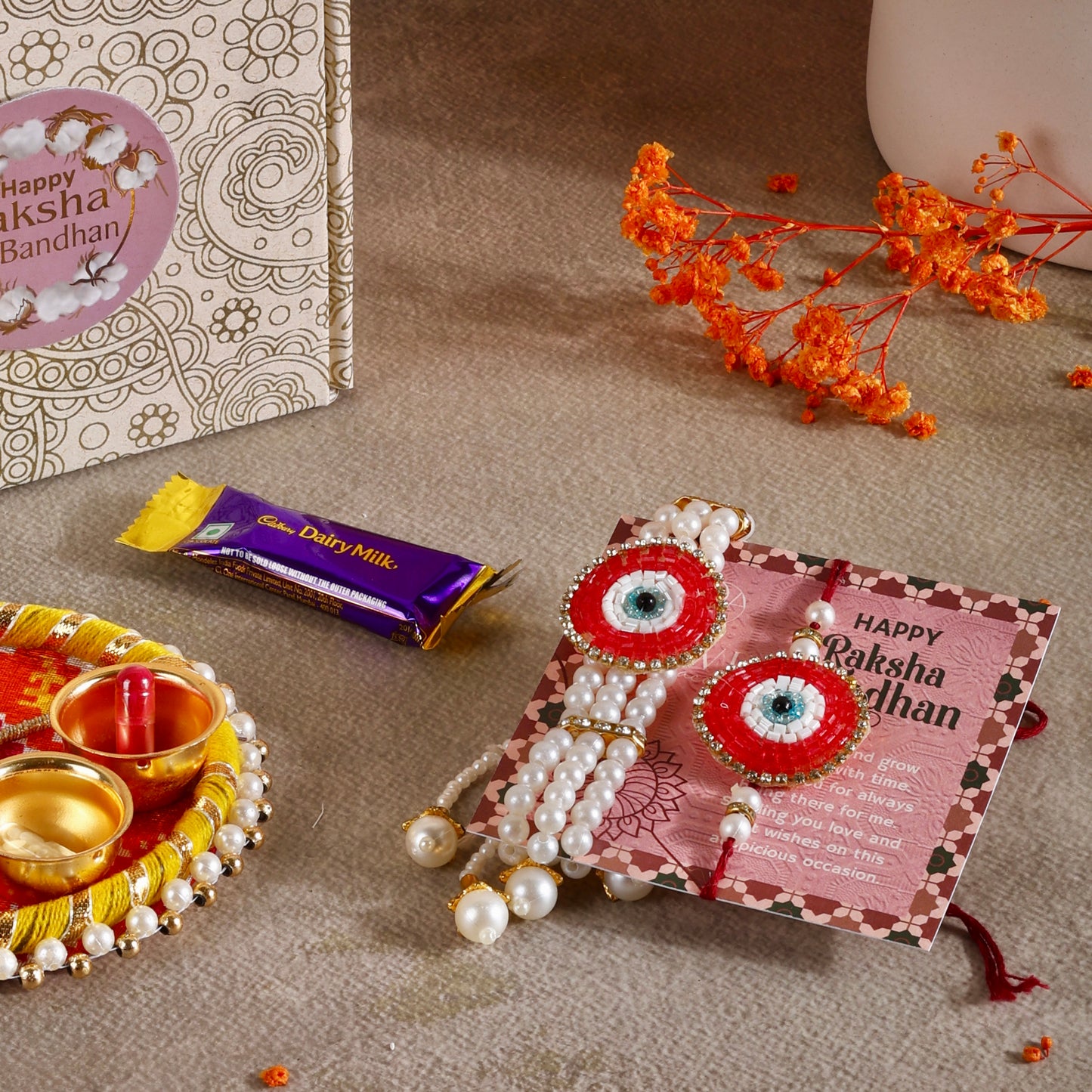 Mini Rakhi Gift Hamper - Eyeconic Bond for Bhaiya Bhabhi